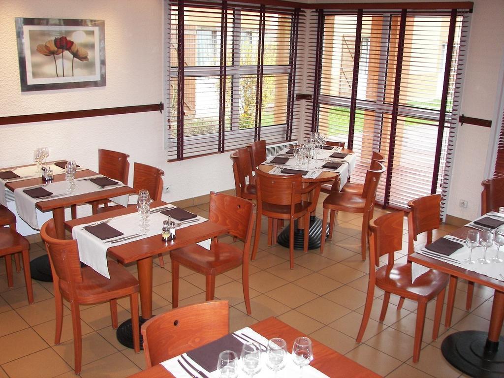 Comfort Hotel Orleans סרן מסעדה תמונה